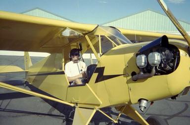 [Picture of me in Piper Cub]