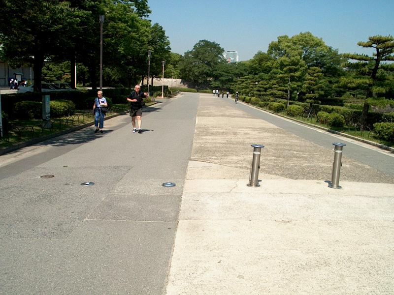 The posts in the road go up and down (lock up) to allow or prevent car traffic