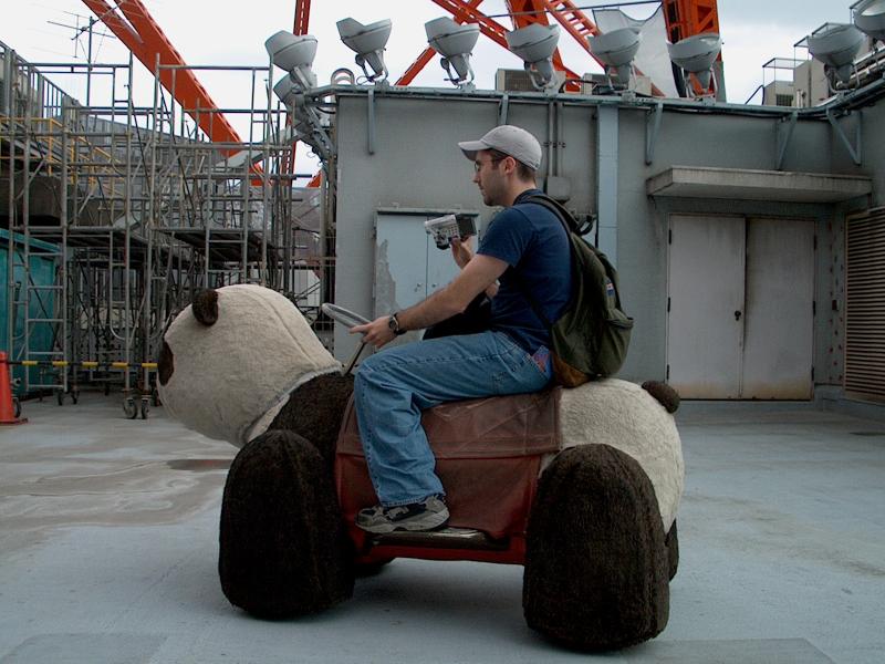 Kevin rides a panda!
